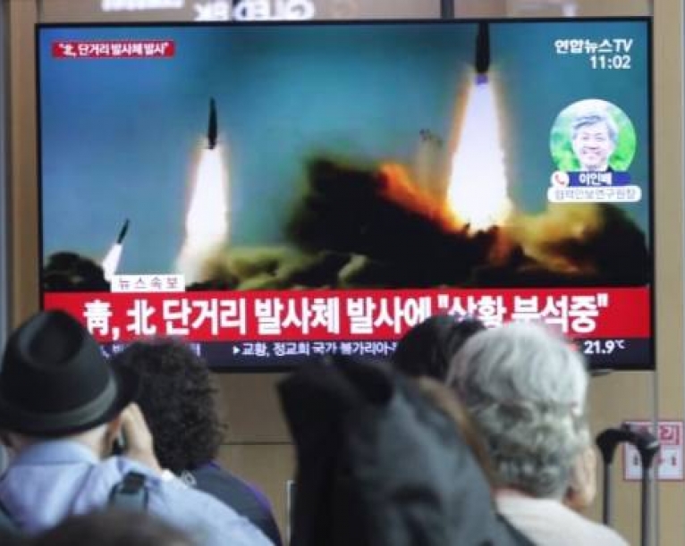 North Korea fires several short-range projectiles into sea.